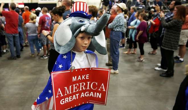 A young supporter ofDonald Trump, in costume for the candidate’s rally in Concord, North Carolina, on Thursday. Photo: Reuters