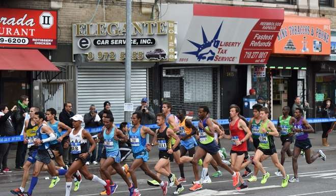 The Men's elite runners race in the 2015 TCS New York City Marathon in New York. Photo: AFP