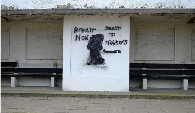 Pro-Brexit graffiti on a beachside shelter in New Brighton, northern England on November 8, 2016. Photo: Reuters