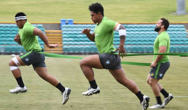 Number eight Lopeti Timani (centre) has impressed for Australia and will start against Scotland. Photo: AFP