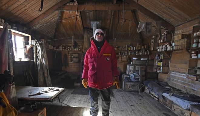 US Secretary of State John Kerry stands inside the historic Shackleton hut near McMurdo Station, Antarctica. Photo: AP