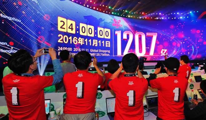 Alibaba's online marketplace Tmall had recorded 120.7 billion yuan as the clock struck midnight. Photo: Xinhua
