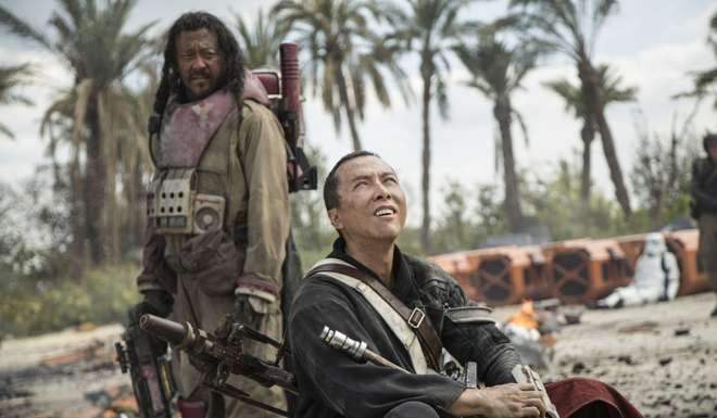 Baze Malbus (Jiang Wen, left) and Chirrut Imwe (Donnie Yen) in a scene from Rogue One: A Star Wars Story. Photo: Jonathan Olley/Lucasfilm