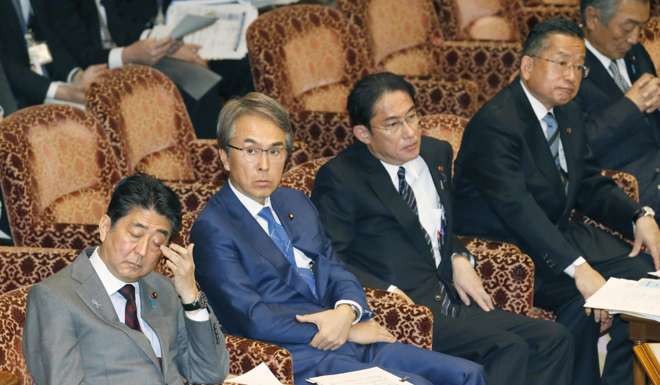 Prime Minister Shinzo Abe, TPP minister Nobuteru Ishihara, Foreign Minister Fumio Kishida and farm minister Yuji Yamamoto attend an upper house special committee session on TPP. Photo: Kyodo