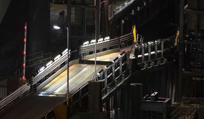 The truck loading ramp at the Interisland Ferry wharf lays dropped and broken, in Wellington, after the earthquake. Photo: AP