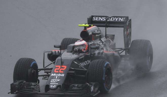 McLaren driver Jenson Button during the Brazilian Grand Prix a . (AP Photo/Ricardo Mazalan)