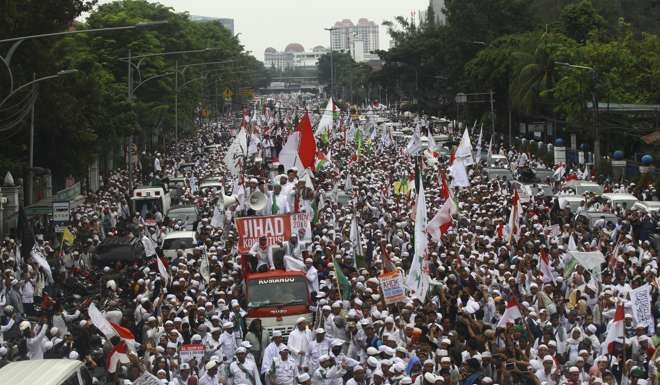 Thousands of people belonging to Islamic-based groups rally in Jakarta to protest against Governor Basuki ‘Ahok’ Tjahaja Purnama, who is accused of insulting Islam. Photo: AFP