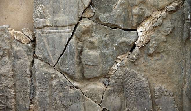 A part of carved stone slabs which were destroyed by Islamic State militants at the ancient site of Nimrud. Photo: AP