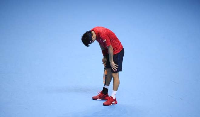 Japan's Kei Nishikori reacts during his round robin match with Great Britain's Andy Murray Reuters / Toby Melville