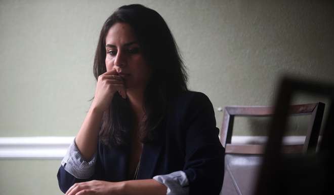 Blanca Lopez at her family's home in Union City, California. Lopez was granted temporary relief from deportation under a federal programme known as DACA, but her renewal application has yet to arrive and has caused her temporary legal status to expire. As a result, Lopez was terminated from her job at Workday. Photo: Bay Area News Group/TNS