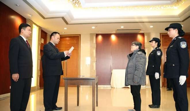 Yang Xiuzhu arrives at Beijing Capital International Airport. Photo: Xinhua