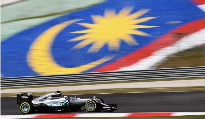 Lewis Hamilton drives his Mercedes during a practice session for the Formula One Malaysia Grand Prix in Sepang. Malaysia will discontinue its Formula One Grand Prix race after 2018 due to falling revenues. Photo: AFP