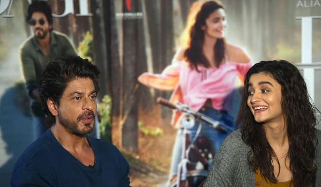 Shah Rukh Khan with his Dear Life co-star Alia Bhatt. Photo: AFP