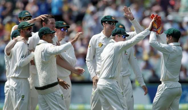 Australia wicketkeeper Matthew Wade (right) had five dismissals, four catches and a stumping, on the opening day of the third test. Photo: Reuters