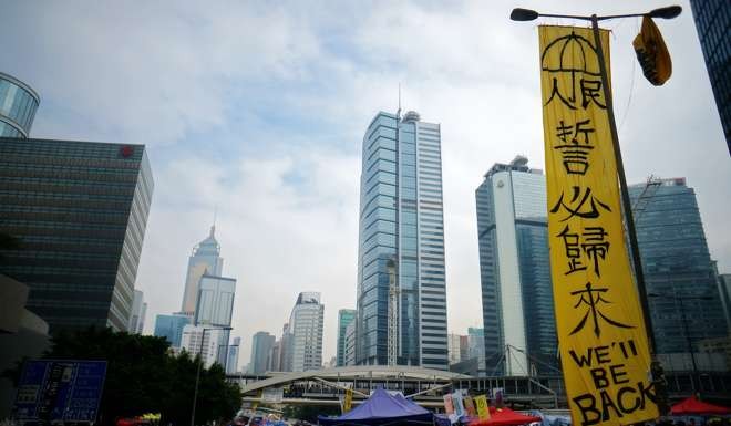 A sign displayed in Admiralty as the protest there drew to a close in December 2014. Photo: P. H. Yang