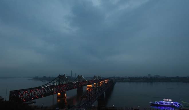 The Sino-Korean Friendship Bridge, viewed from Dandong, in northeast China. Chinese tourism to North Korea is increasing thanks to loosening restrictions. Photo: AFP