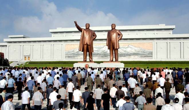 Statues of the former North Korea leaders Kim Jong-il, right, and his father Kim Il-sung, at the Mansudae in Pyongyang. Photo: AFP