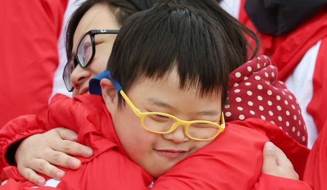 People with special needs take part in an event to promote an inclusive society. Photo: Nora Tam