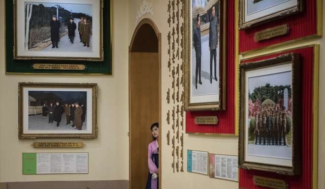 A guide waits for visitors during a tour of Mangyongdae, the birthplace of late founder of North Korea Kim Il-Sung. Photo: AFP