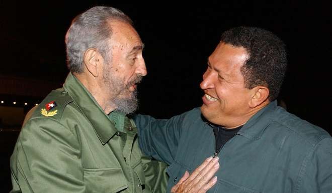 Fidel Castro with Venezuelan counterpart Hugo Chavez in 2013. Photo: EPA