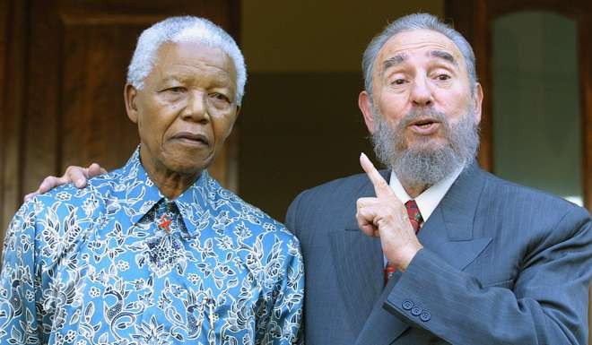 Fidel Castro with Nelson Mandela in 2001. Photo: AFP