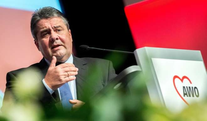 German Economy Minister Sigmar Gabriel has reopened a review of the takeover of Aixtron, which supplies equipment to the semiconductor industry, by China’s Grand Chip Investment GmbH. It follows calls by Gabriel for European Union measures to give national governments more powers to block or impose conditions on shareholdings of non-EU companies. Photo: EPA