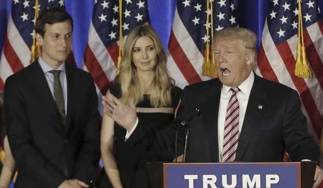 US president-elect Donald Trump with son-in-law Jared Kushner and daughter Ivanka. Photo: Reuters