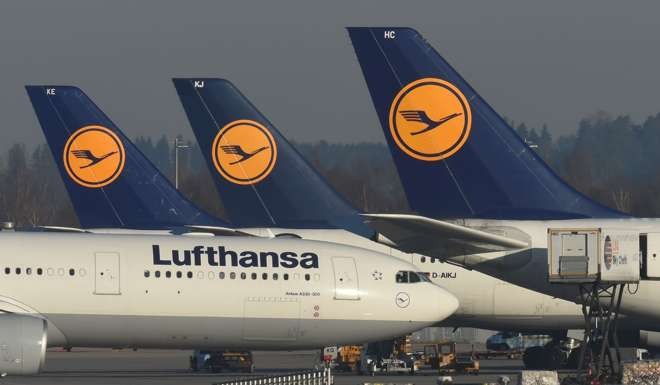 An Airbus A330 rolls between Lufthansa airplane's which parked in front of the Lufthansa terminal of the Franz-Josef-Strauss airport in Munich, southern Germany, during a strike of pilots of the German airline Lufthansa on November 29, 2016. Photo: AFP