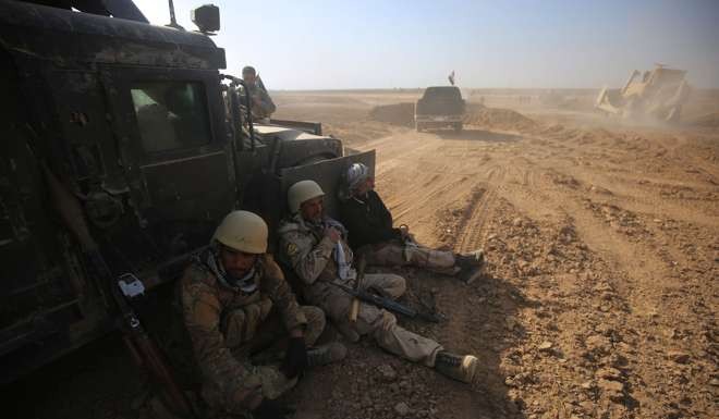 Iraqi Shiite fighters from the Hashed al-Shaabi paramilitary unit. photo: AFP