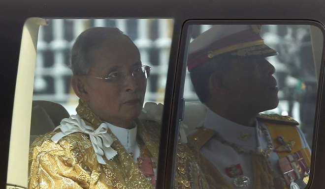 Crown Prince Maha Vajiralongkorn (right) with his father, the late-King Bhumibol Adulyadej in 2012. Vajiralongkorn will be named Rama X of Thailand’s Chakri dynasty, but will not formally be crowned until after his father’s cremation, which is expected next year. File photo: Reuters