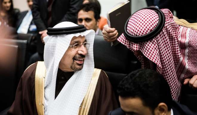 Khalid Al-Falih, Saudi Arabia's energy and industry minister, speaks to a member of his delegation ahead of the 171st Organization of Petroleum Exporting Countries (OPEC) meeting in Vienna. Photo: Bloomberg