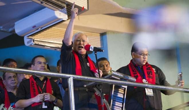 Malaysian Prime Minister Najib Razak addresses the crowd at a protest against the persecution of Rohingya Muslims in Myanmar. Photo: AP