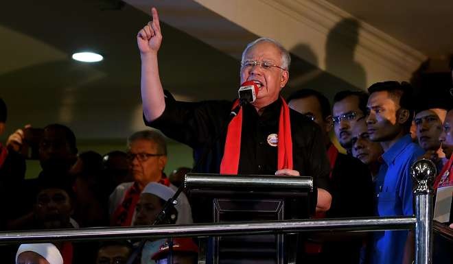 ‘What’s the use of Aung San Suu Kyi having a Nobel [Peace] Prize?’ Najib asked a raucous crowd in Kuala Lumpur. Photo: AFP