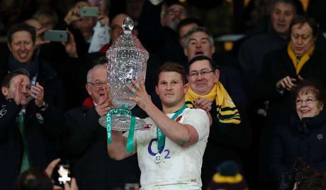 England captain Dylan Hartley lifts the Cook Cup after their victory. Photo: AFP