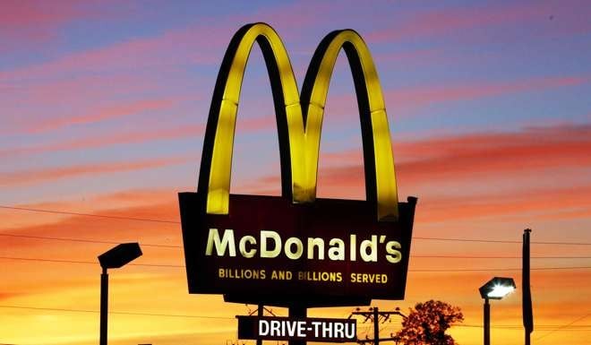 The sun sets behind a McDonald's restaurant in Ebensburg, Pennsylvania. Photo: AP