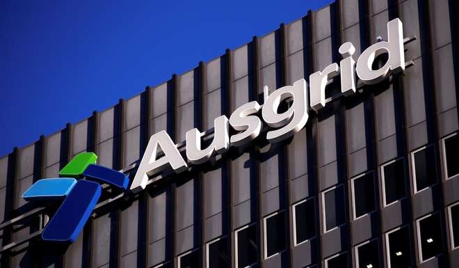 The logo for Australia's biggest electricity network Ausgrid adorns the headquarters building in central Sydney, Australia. Photo: Reuters