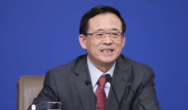 Liu Shiyu, director of China Securities Regulatory Commission (CSRC), criticised asset managers making aggressive, highly leveraged takeover bids. Photo: Simon Song