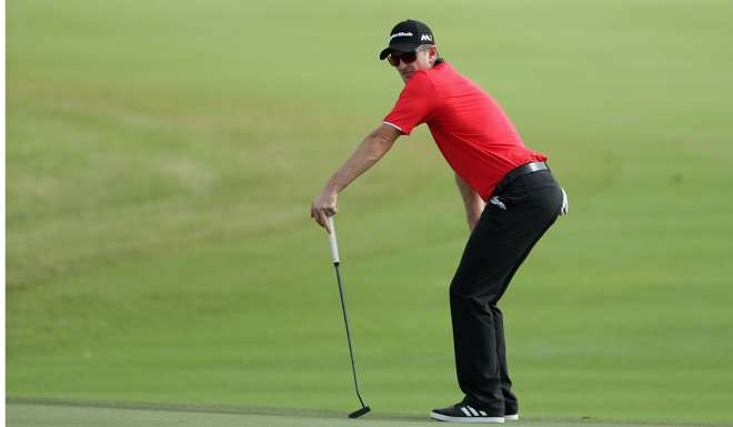 Justin Rose of England reacts to his putt on the ninth green during round one of the Hero World Challenge at Albany, The Bahamas on December 1, 2016 in Nassau, Bahamas. Christian Petersen/Getty Images/AFP