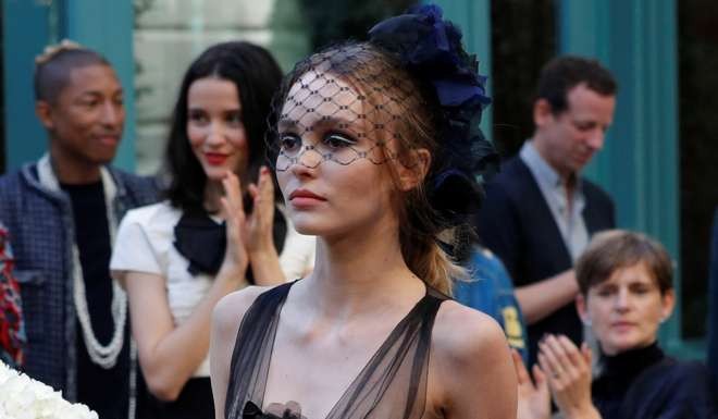 Lily-Rose Depp on the “catwalk” at the Ritz. Photo: Reuters