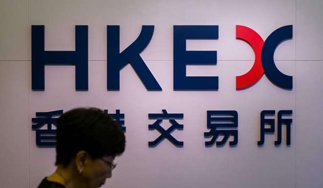 Falling turnover at the Hong Kong Stock Exchange has hurt earnings at both the Hong Kong Exchanges and Clearing Limited, and now the The Securities and Futures Commission. Photo: AFP