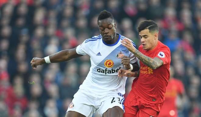 Sunderland's French-born Ivorian defender Lamine Kone vies with Liverpool's Brazilian midfielder Philippe Coutinho in the Premier League. Photo: AFP