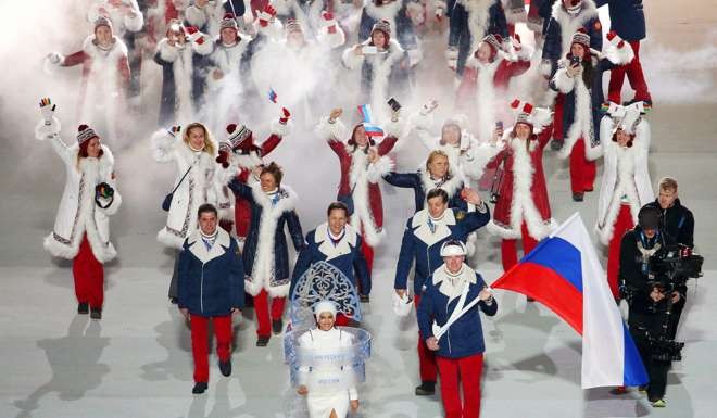 Team Russia at the opening ceremony for the Sochi 2014 Winter Olympic Games. The IOC will reanalyse all 254 urine samples taken from Russian athletes who took part in the Sochi Games. Photo: EPA