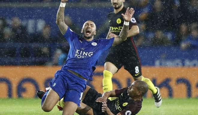 Leicester City defender Danny Simpson hits the deck. Photo: AFP