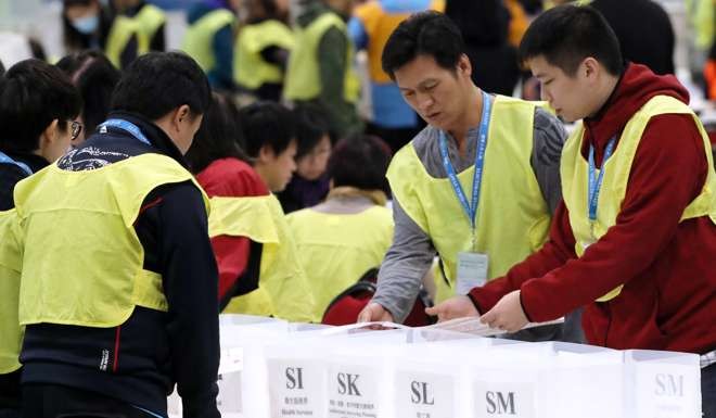 Vote counting at AsiaWorld-Expo on Lantau Island. Photo: Edward Wong