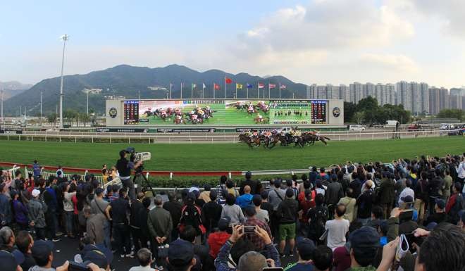 They’re off and racing in the Longines Hong Kong Cup – the Jockey Club said more than 107,000 fans watched the action at Sha Tin and Happy Valley. Photo: Kenneth Chan