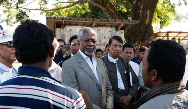 Former UN secretary general Kofi Annan commissioner Aye Lwin of the multi-sector advisory commission meet with the Muslim community in Kyatyoepyin village in Maungdaw. Photo: AFP