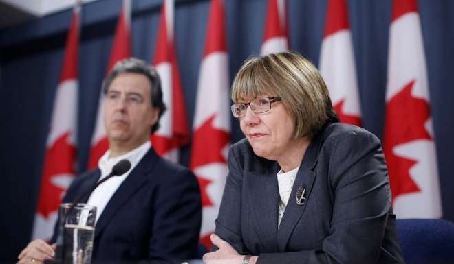 Anne McLellan, Chair of the Task Force on Cannabis Legalisation and Regulation, and vice chair Mark Ware take part in a news conference in Ottawa on Tuesday. Photo: Reuters