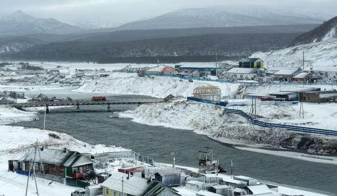 The town of Kurilsk on the island of Iturup in the Kurils. Russian President Vladimir Putin heads to Japan on December 15, 2016 to meet Prime Minister Shinzo Abe, the latest bid to reach a deal on a territorial dispute that has prevented their nations signing a formal treaty to end the second world war. Photo: AFP