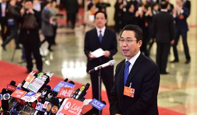 Shen Changyu, commissioner of the State Intellectual Property Office, addresses the media at the Great Hall of the People in Beijing on March 13. Photo: Xinhua