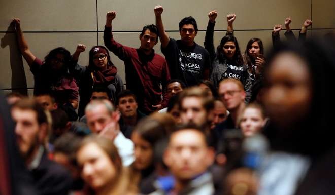 Undocumented students at the Texas A&M University in College Station, Texas, and their supporters protest silently as white nationalist leader Richard Spencer speaks this month at an event on campus that was not sanctioned by the school. Spencer is a leader of the so-called “alt-right” movement in the US, an offshoot of conservatism mixing racism, white nationalism and populism. Photo: AP